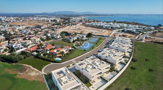 Sea front contemporary villa with swimming pool under construction.